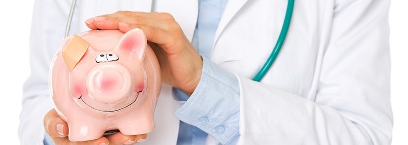 Physiatrist holding her cute little piggy bank.